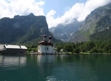 a building next to a body of water