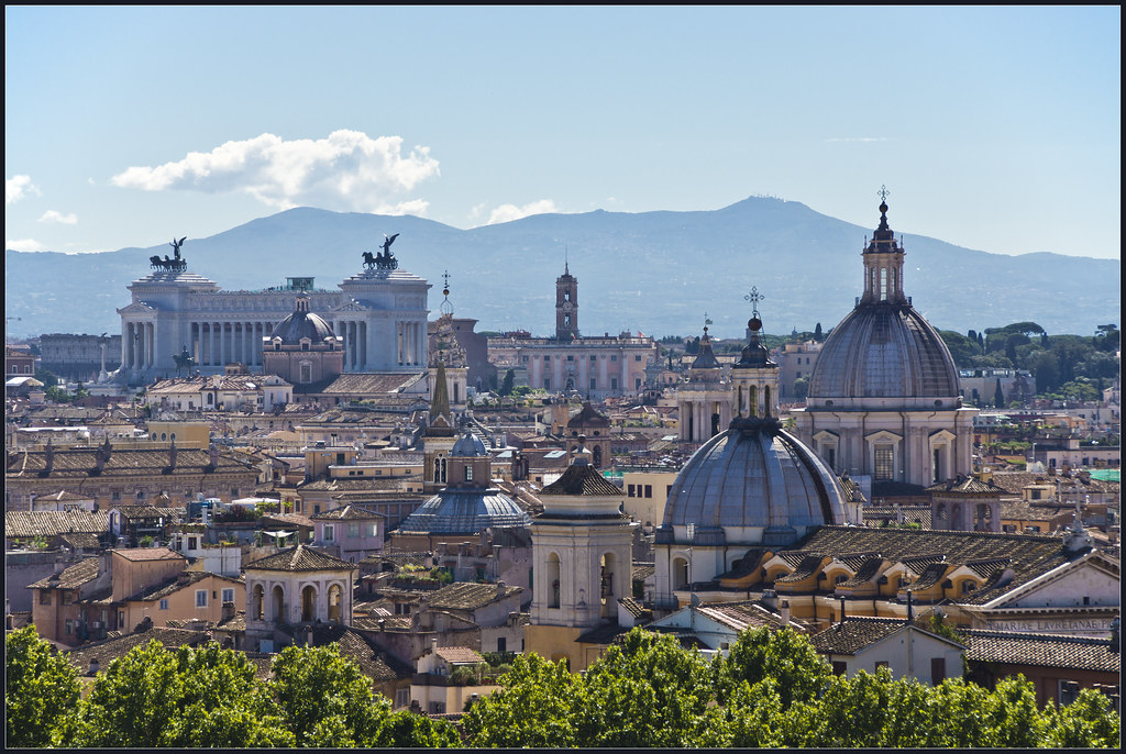 a city with many buildings and trees