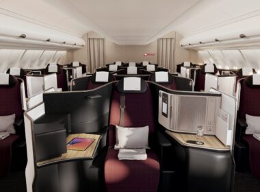 a interior of a plane with rows of seats