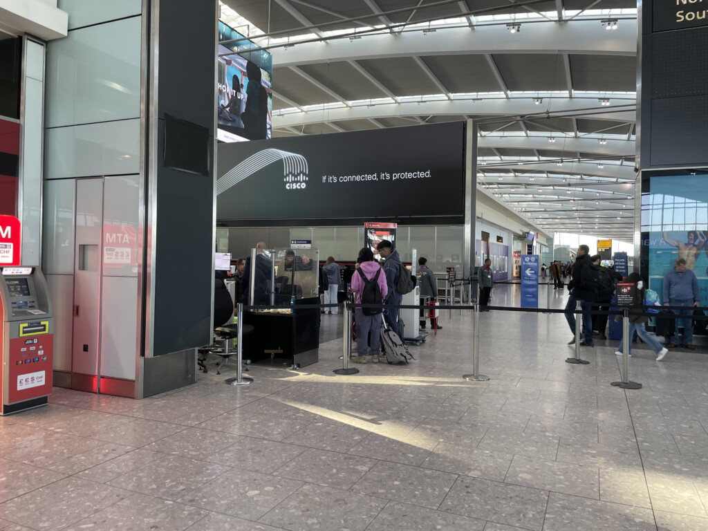 people standing in a terminal