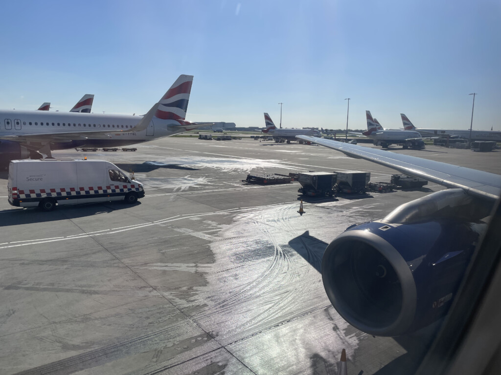 a group of airplanes on a runway