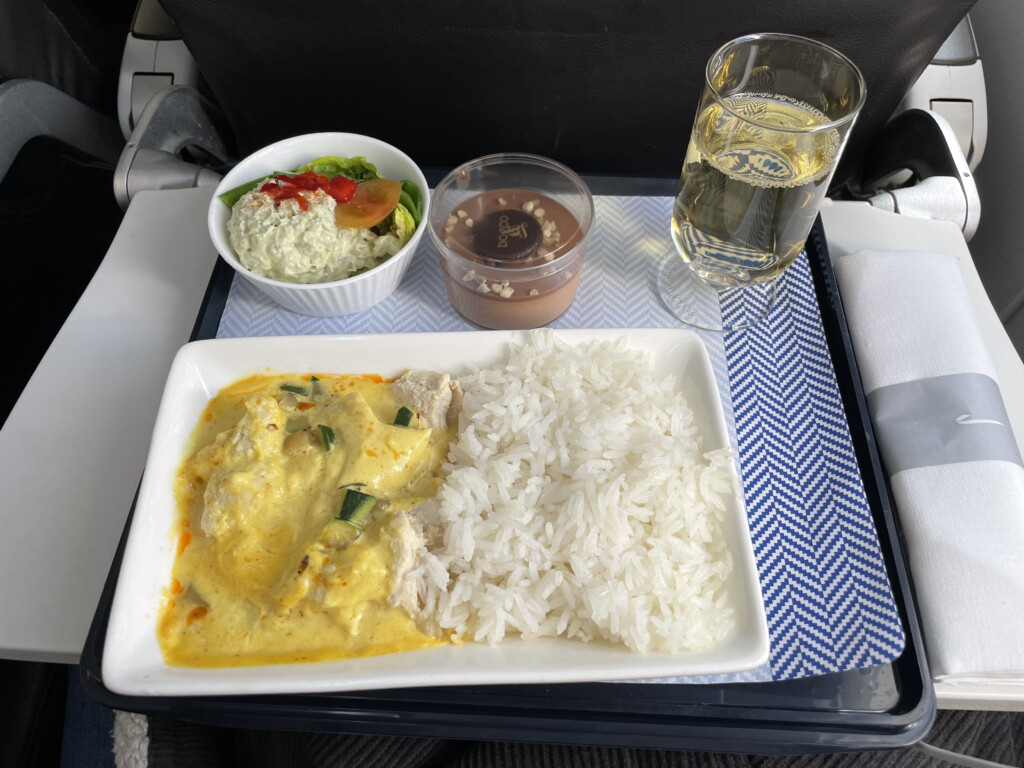 a plate of food on a tray