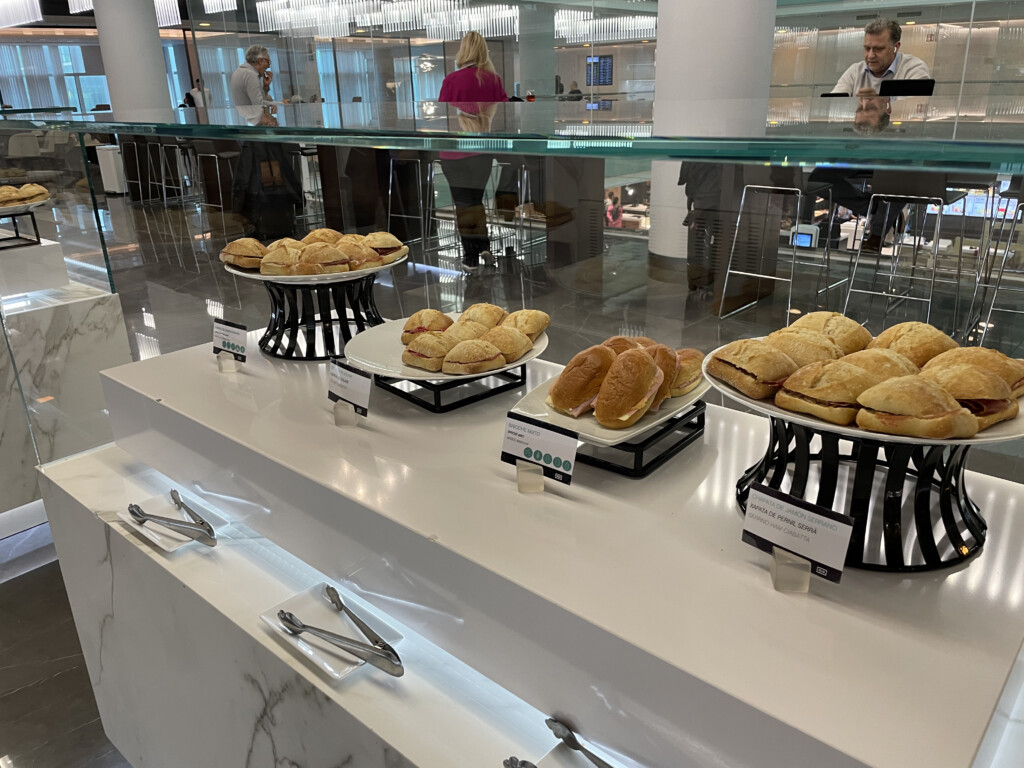 a group of bread on plates on a counter