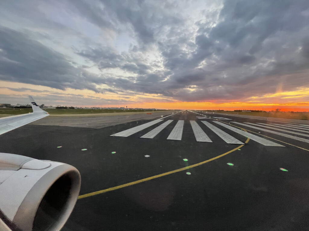 an airplane wing on a runway