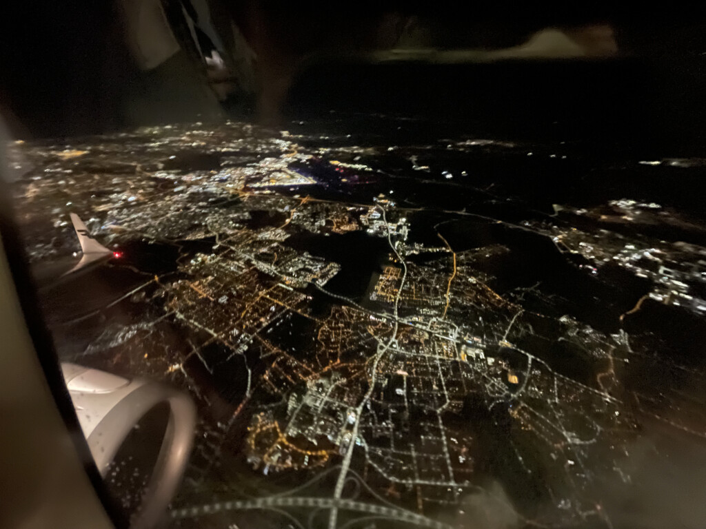 an aerial view of a city at night