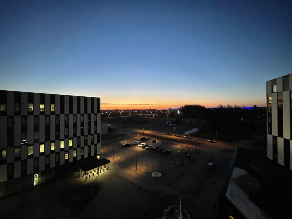 a building with lights on the side of it