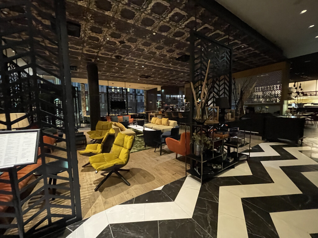 a room with a black and white patterned floor and a black and white patterned floor