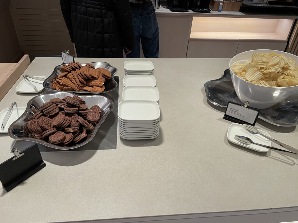 a table with plates of food and plates of food