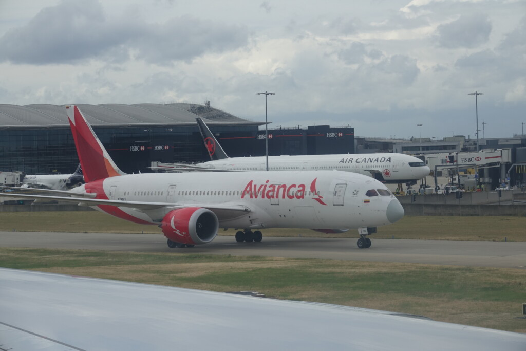 a white airplane on a runway