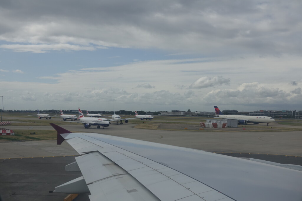 a plane wing on a runway