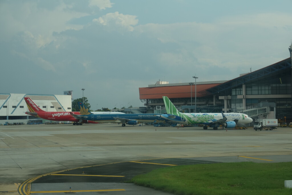 airplanes parked on a runway