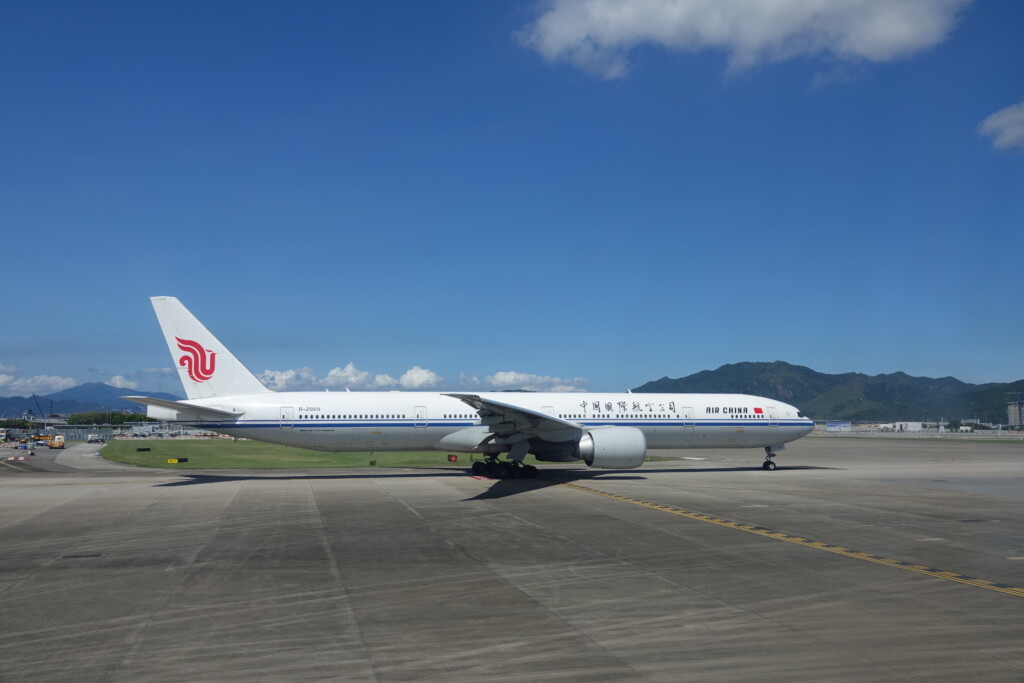 a white airplane on a runway