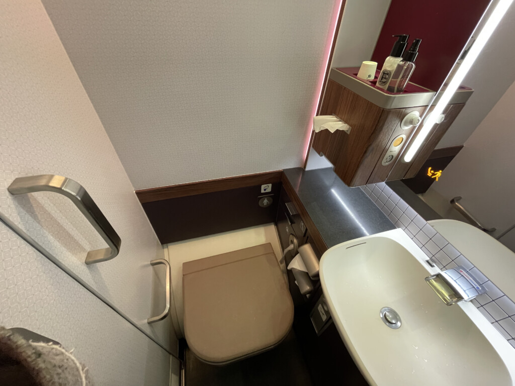 a bathroom with a toilet and sink