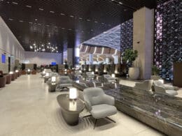 a lobby with chairs and tables