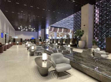 a lobby with chairs and tables