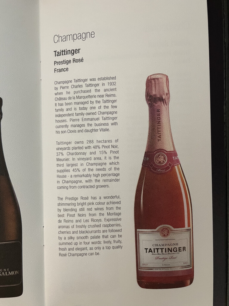 a book with a bottle of champagne