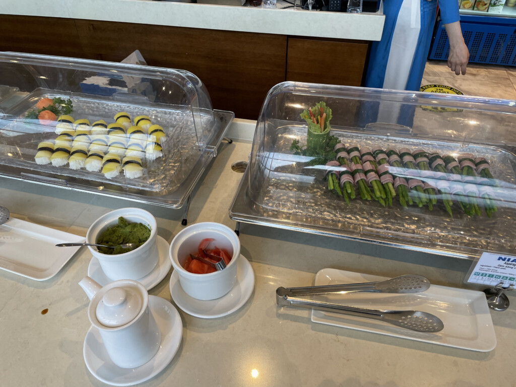 a trays of sushi on a table