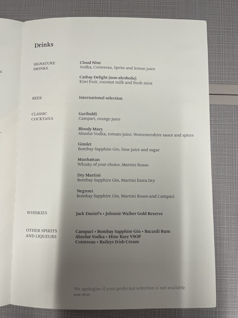 a menu of drinks on a table