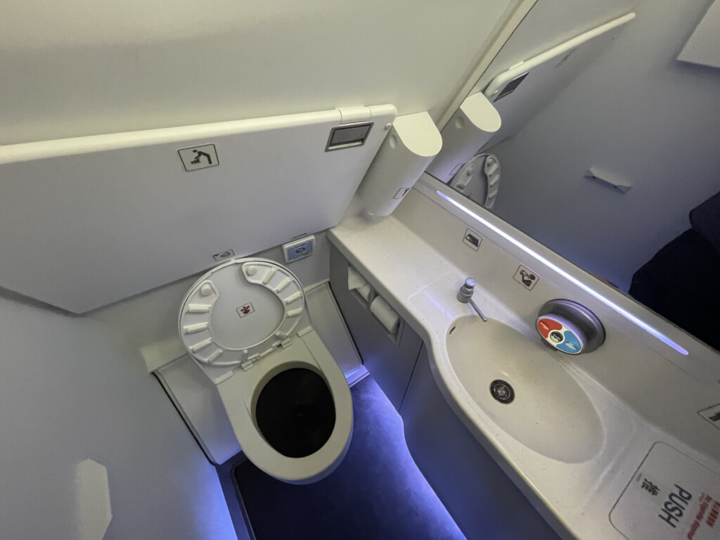 a toilet and sink in a plane