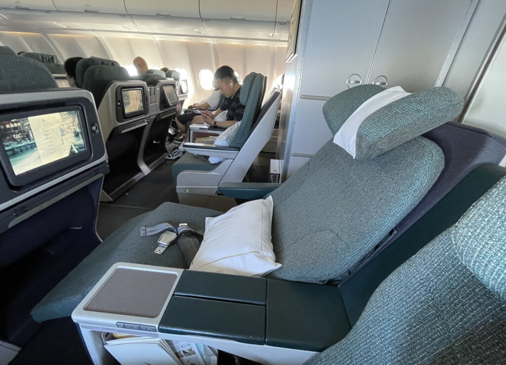 a group of people sitting in an airplane