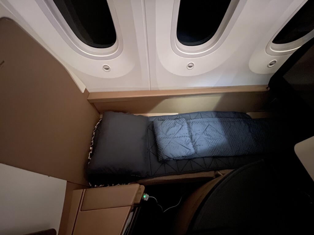 a bed in a plane