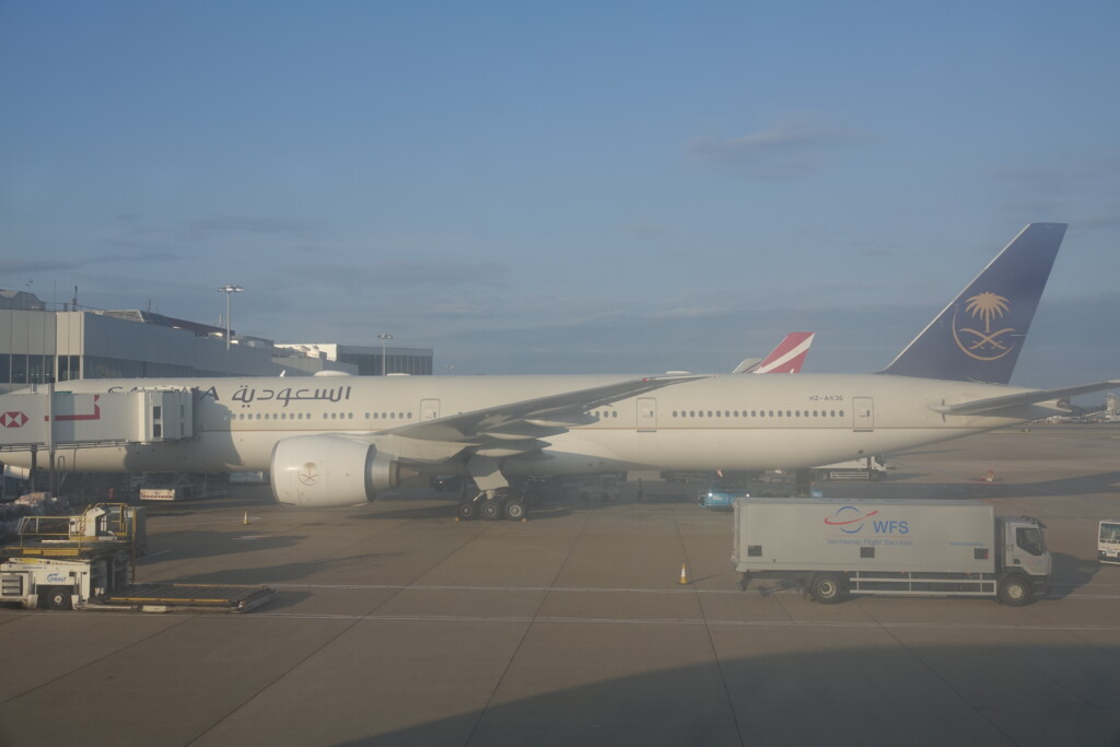 a large white airplane on a tarmac