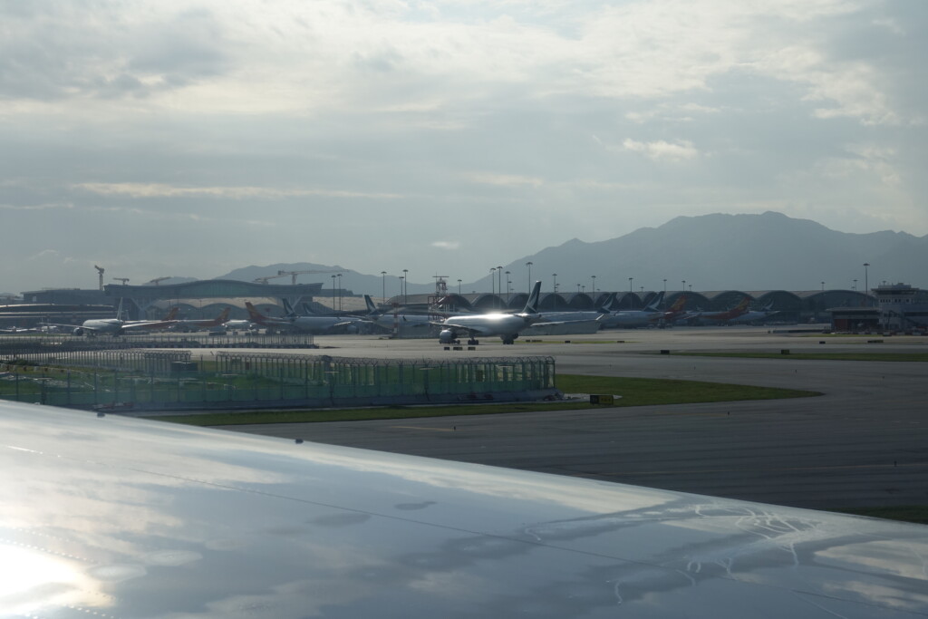 a group of airplanes on a runway