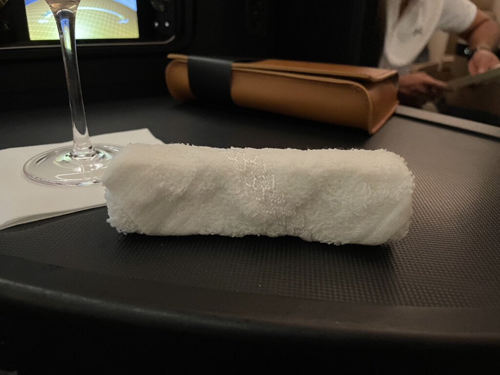 a white towel on a black surface