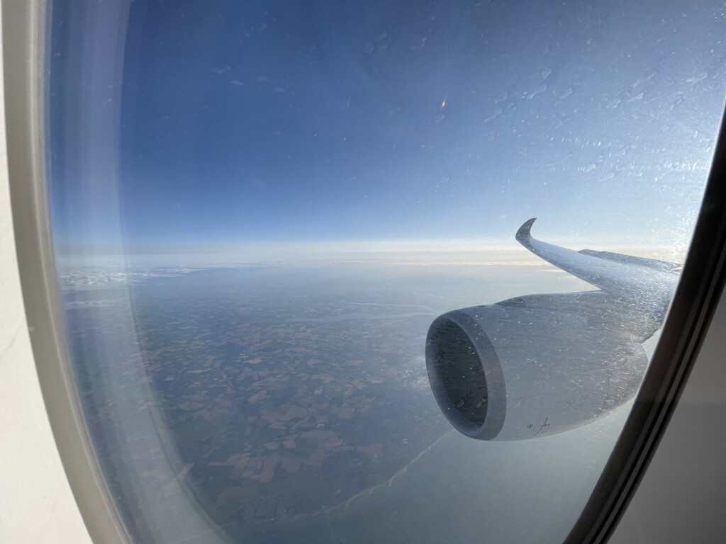 a view of the wing of an airplane from a window