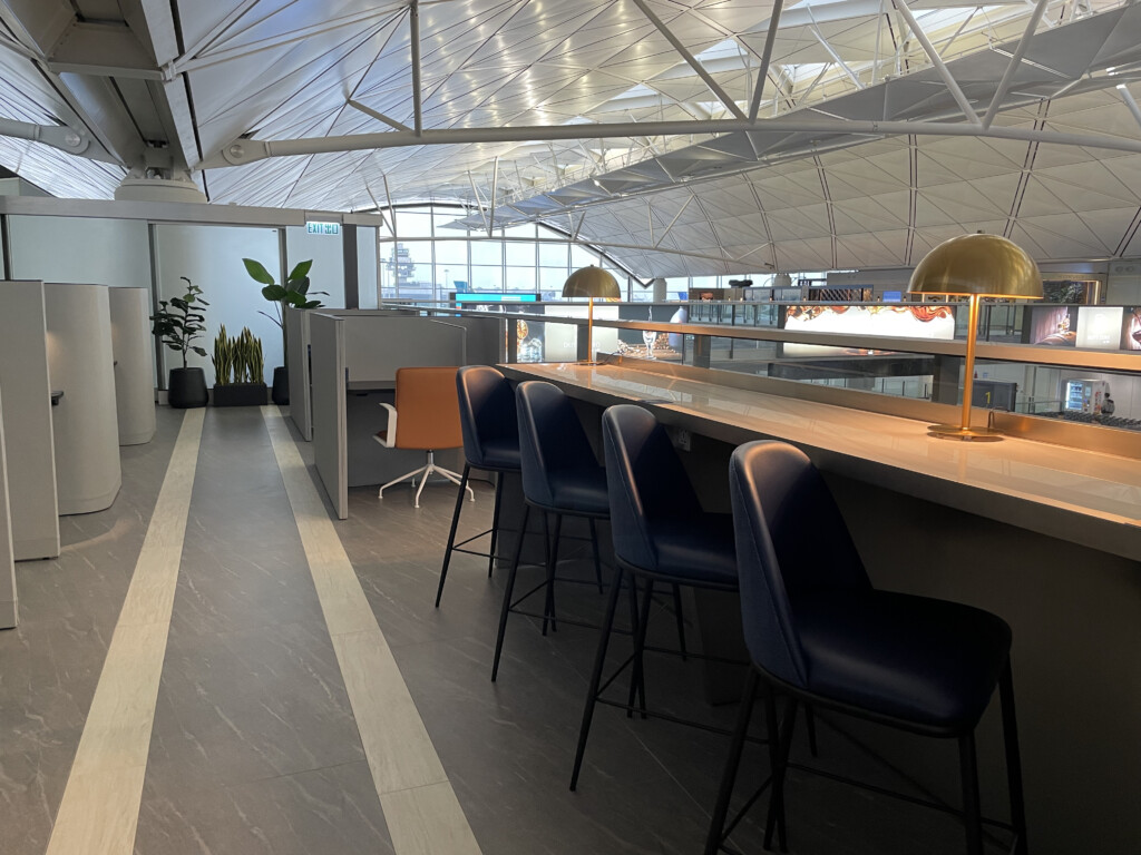 a bar with chairs in a room