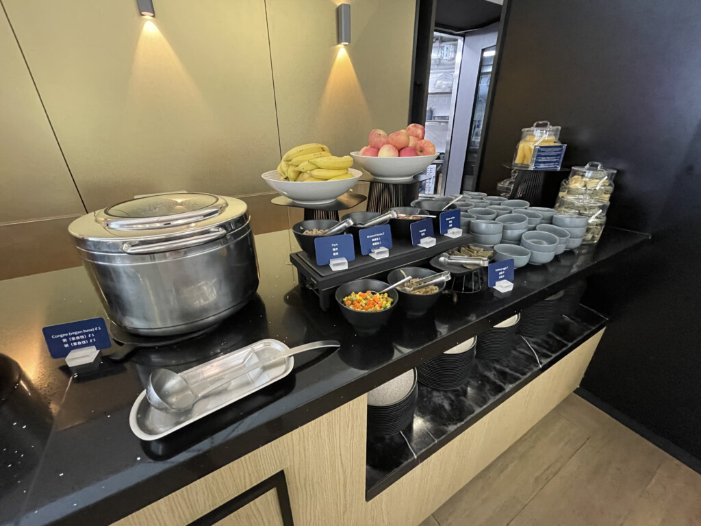 a buffet table with different bowls of food