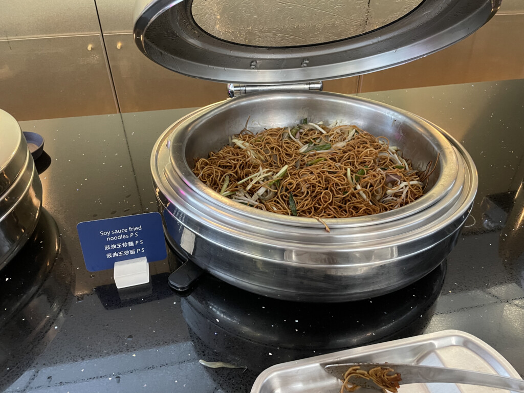 a bowl of noodles on a counter