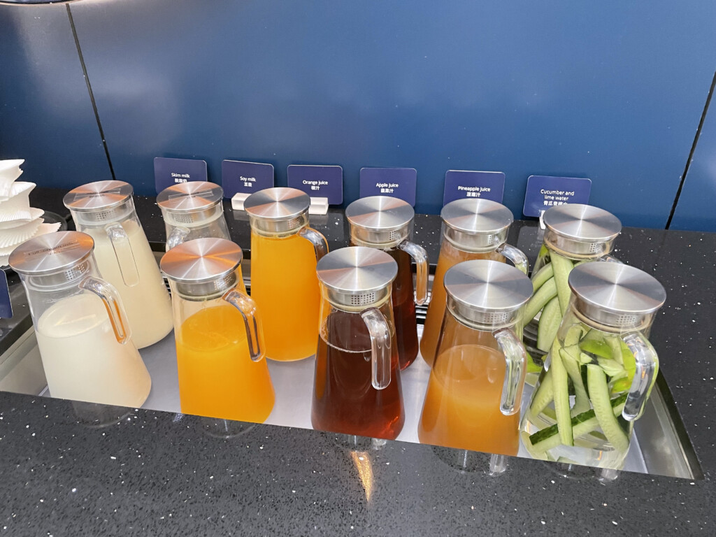 a group of pitcher filled with liquid