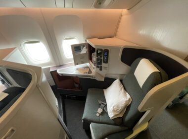 a seat and a table in a plane