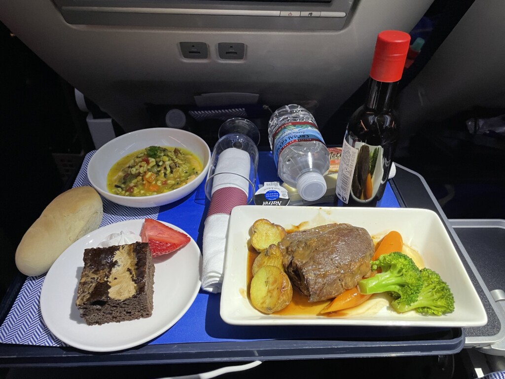 food on a tray on a plane