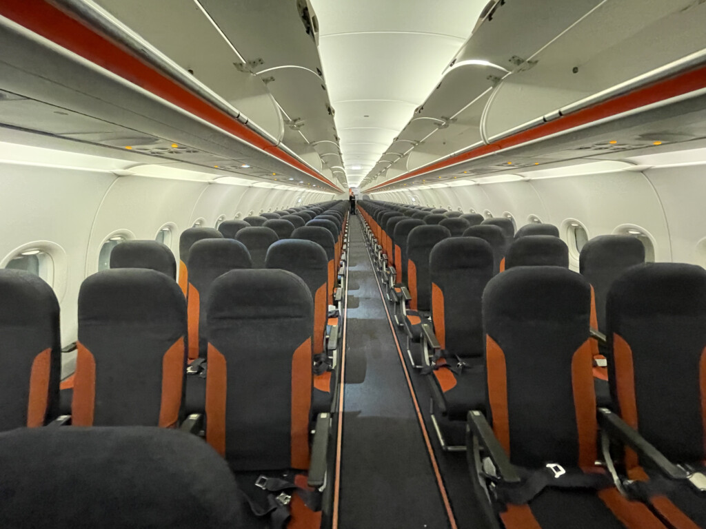 rows of seats in an airplane