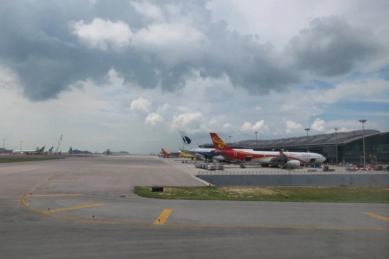 airplanes parked on a runway