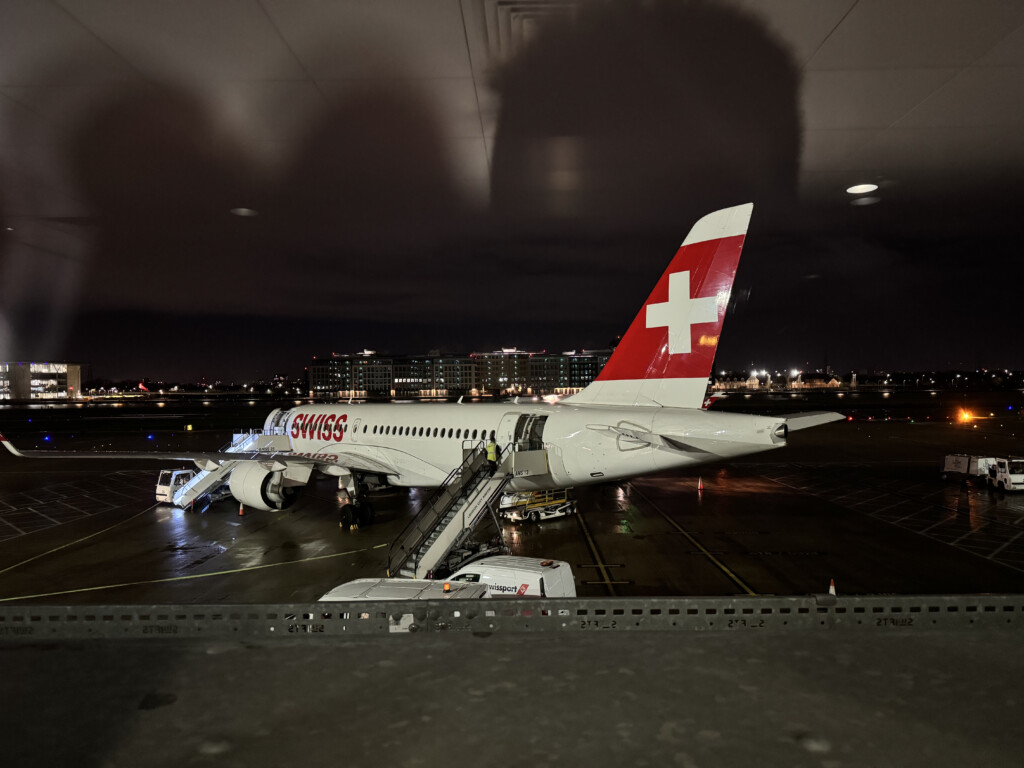 an airplane on the runway at night