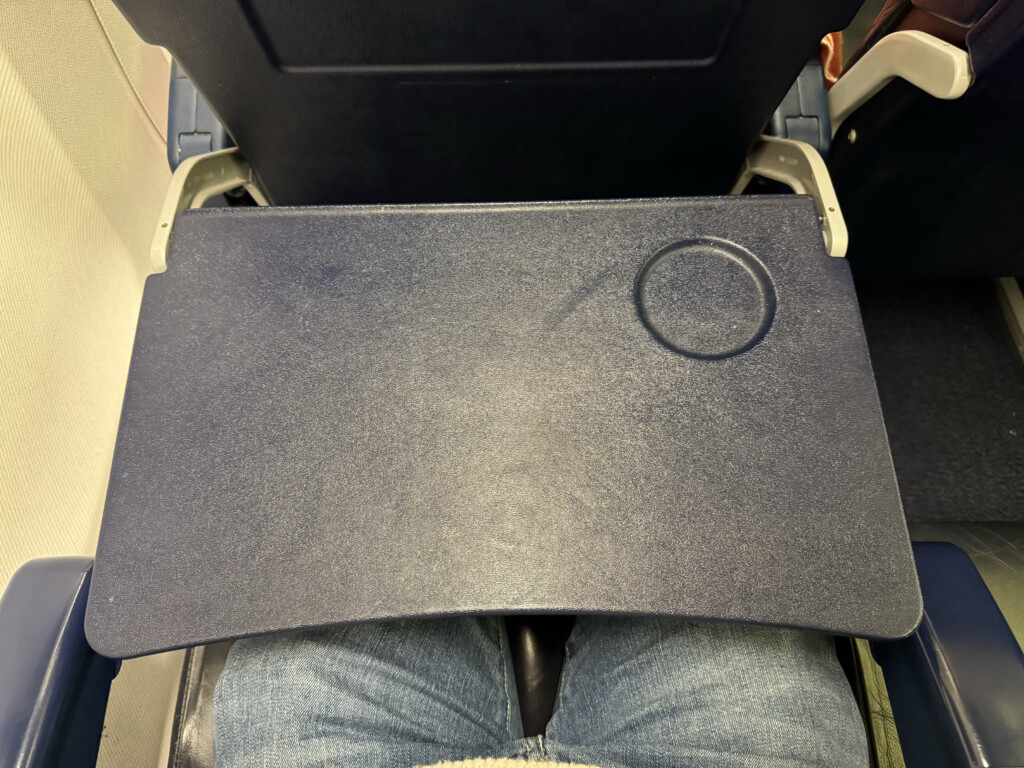 a black tray on a person's lap