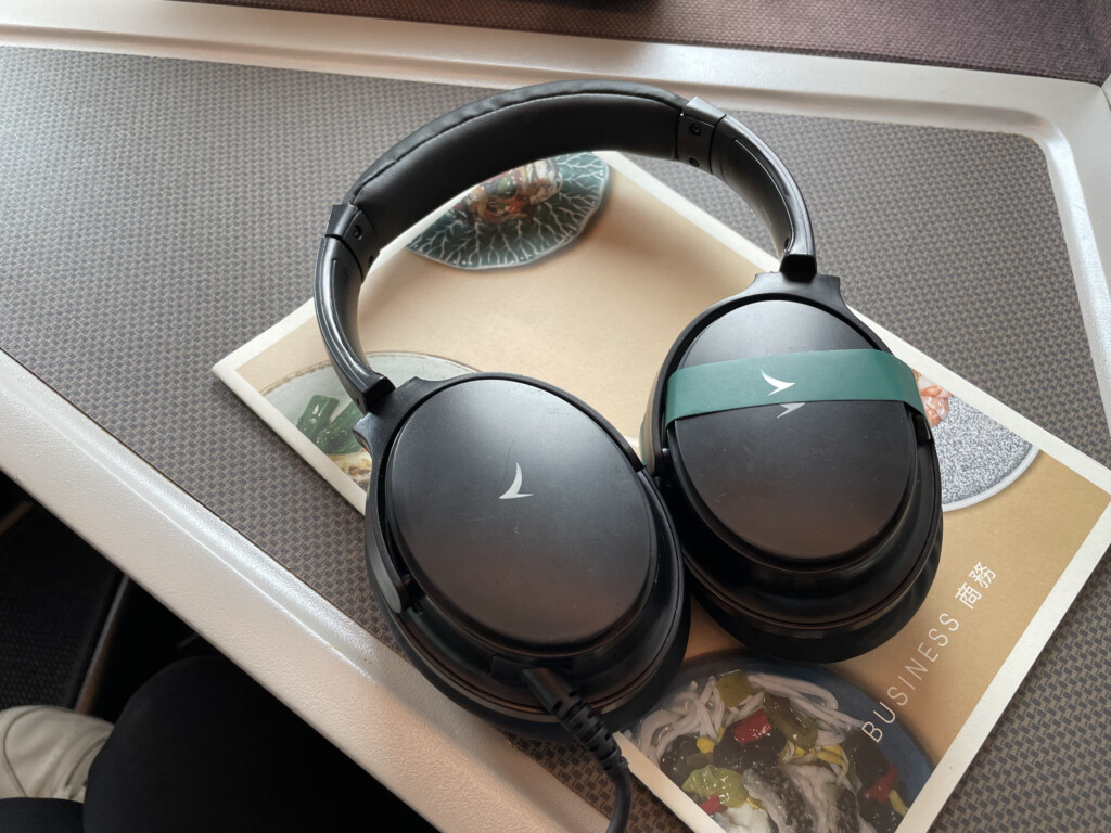 a pair of black headphones on a table