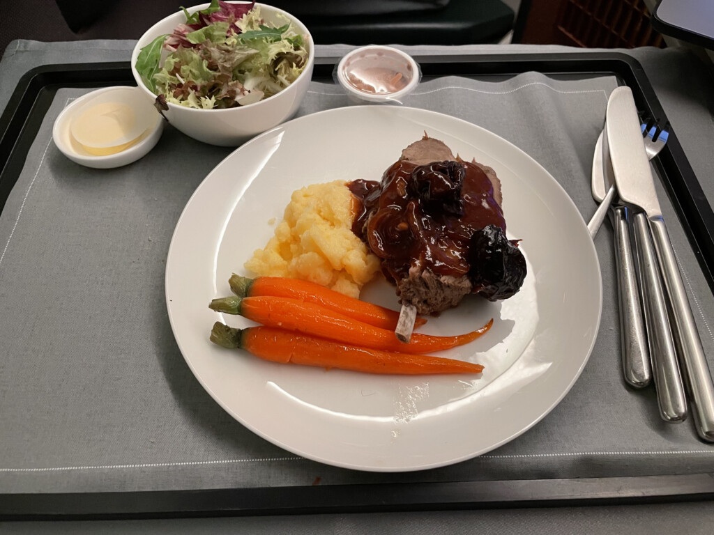 a plate of food on a tray