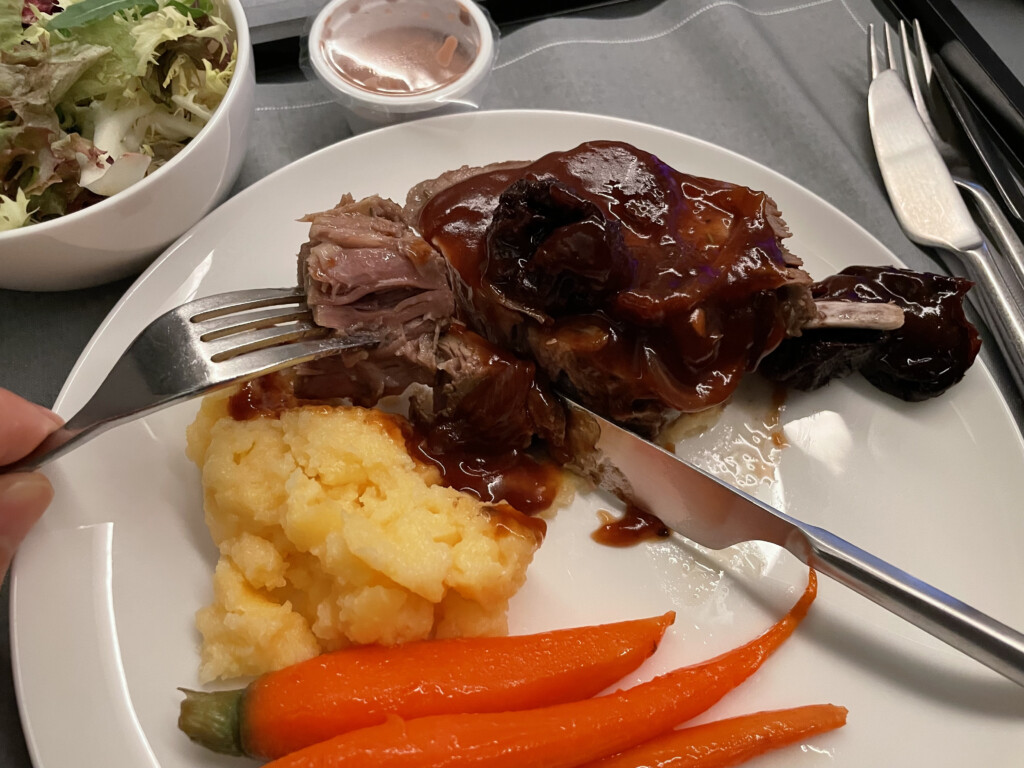 a plate of food with a fork and knife