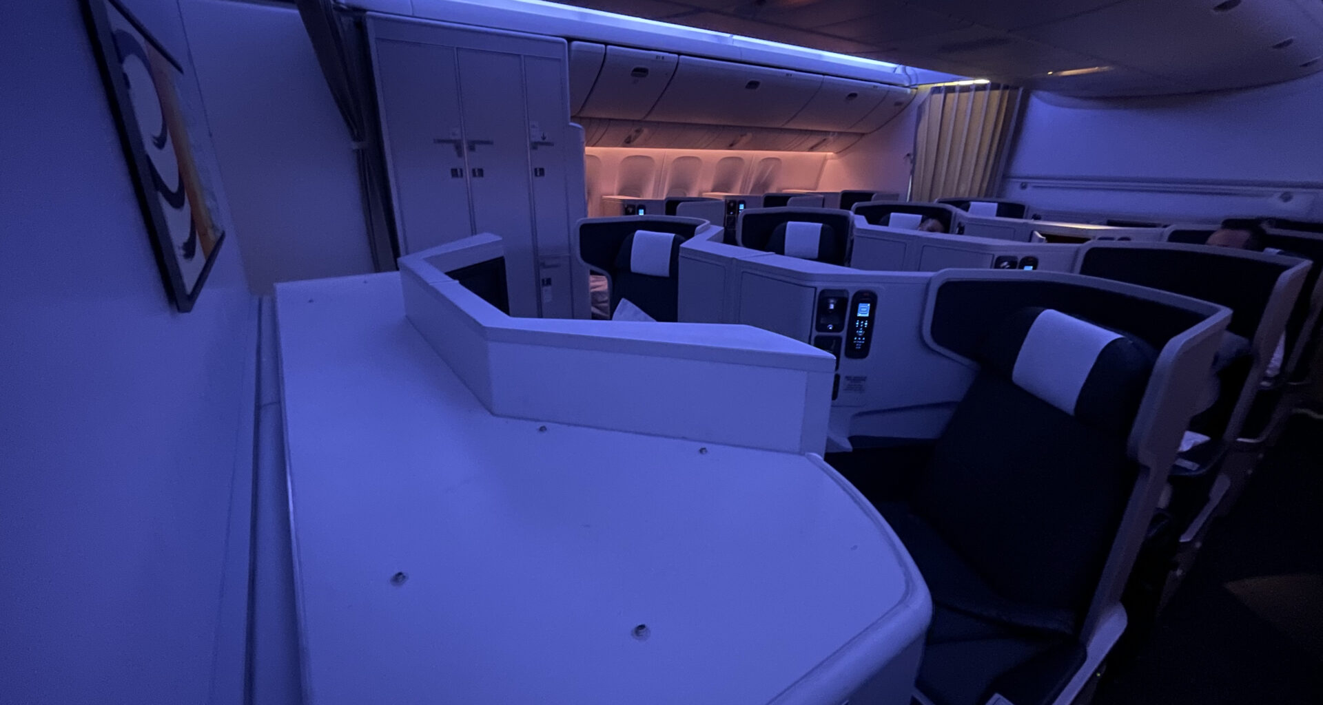 an airplane with seats and a desk