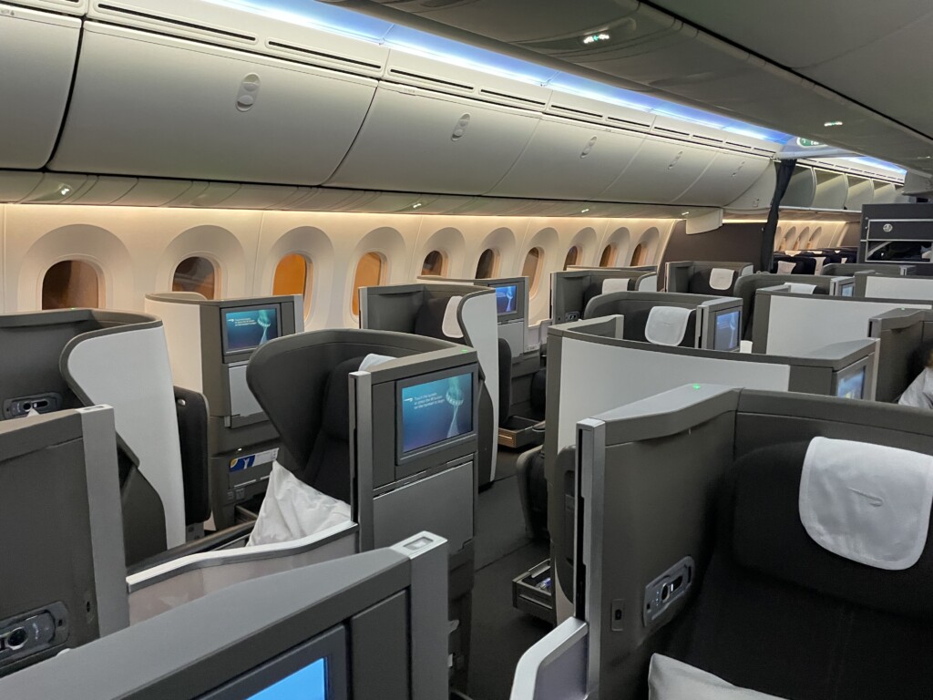 an airplane with rows of seats and windows