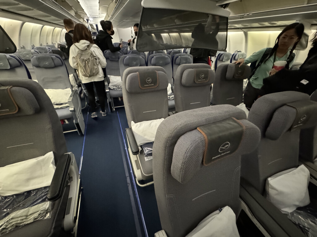 a group of people standing in a plane