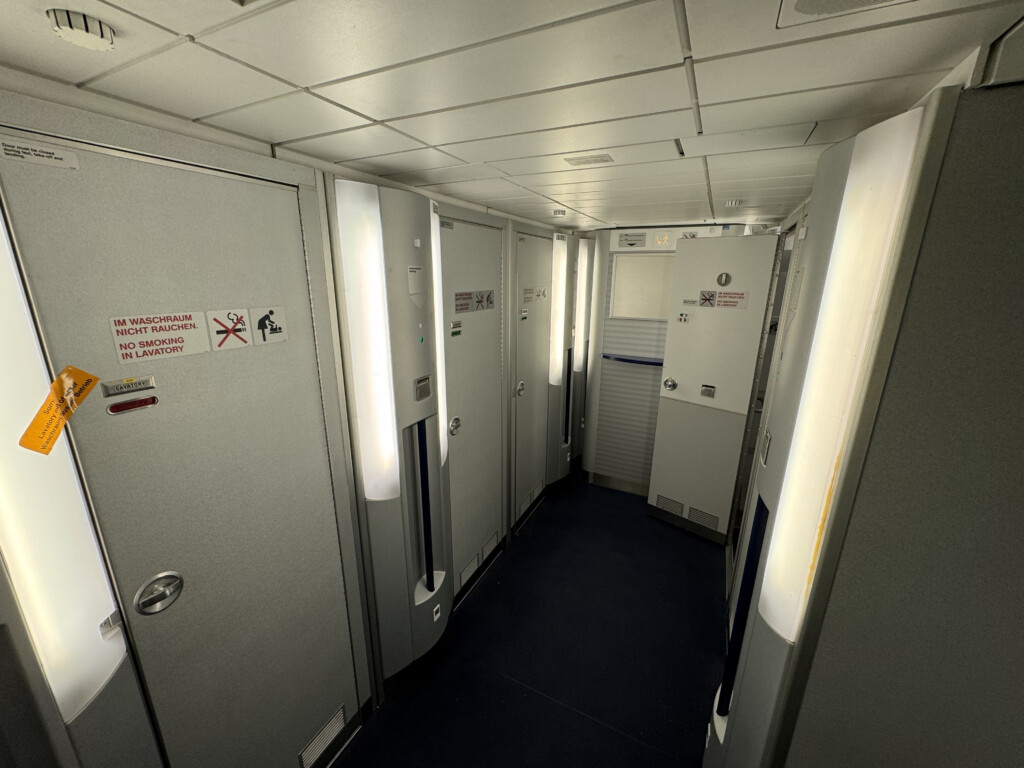 a hallway with lockers and doors