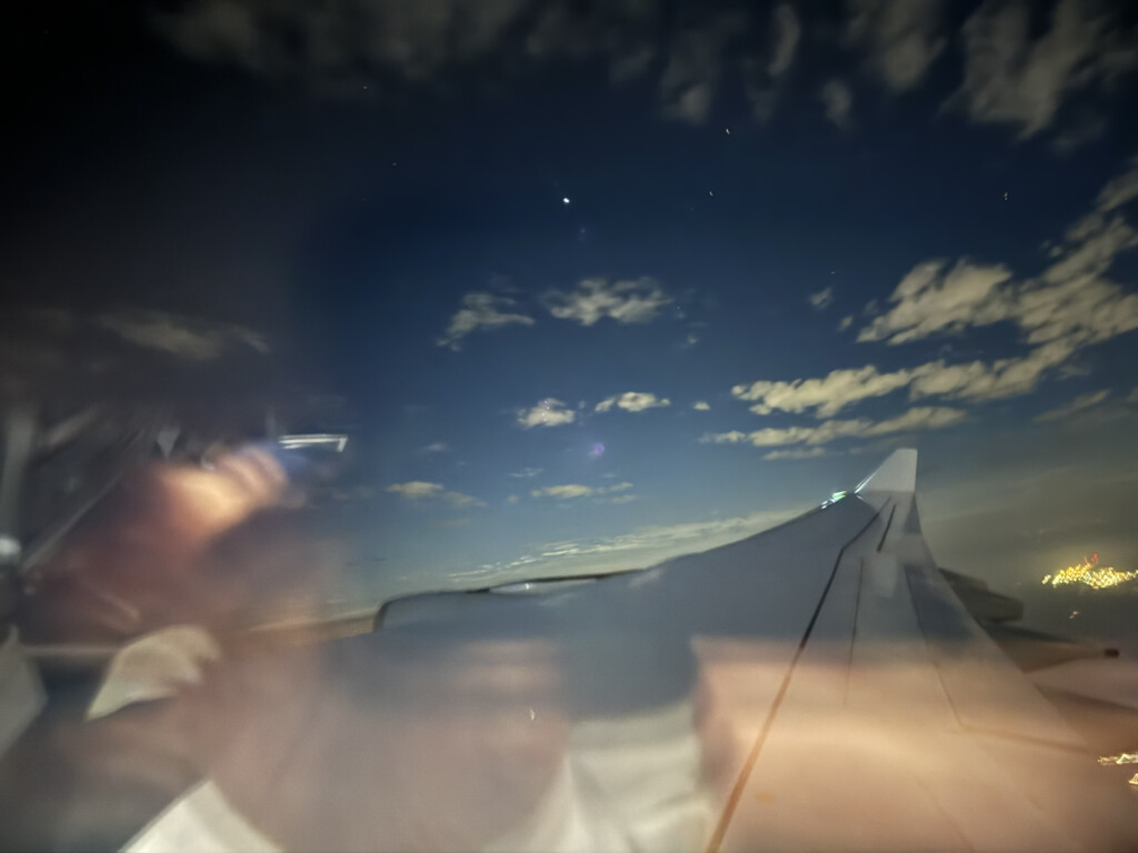 a view of the wing of an airplane