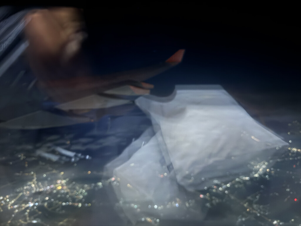 a blurry image of a person's feet on a table