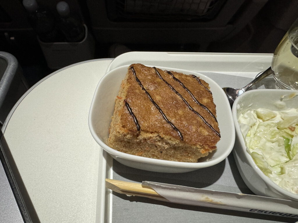 a food in a bowl on a tray