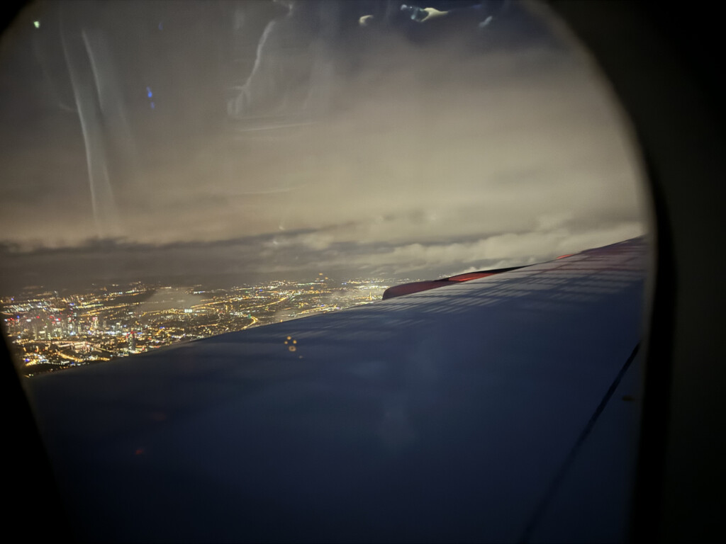 a view of a city from an airplane window